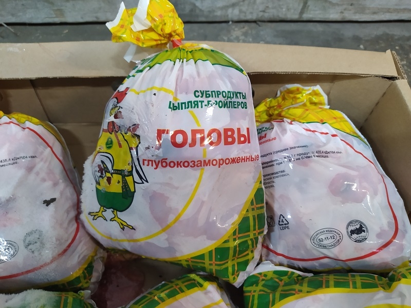 Замороженные куриные головы (цыпленка-бройлера) «СИТНО» купить оптом в Москве по ценам производителя