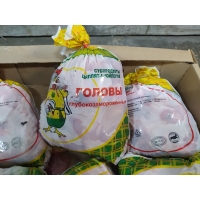 Замороженные куриные головы (цыпленка-бройлера) «СИТНО» купить оптом в Москве по ценам производителя